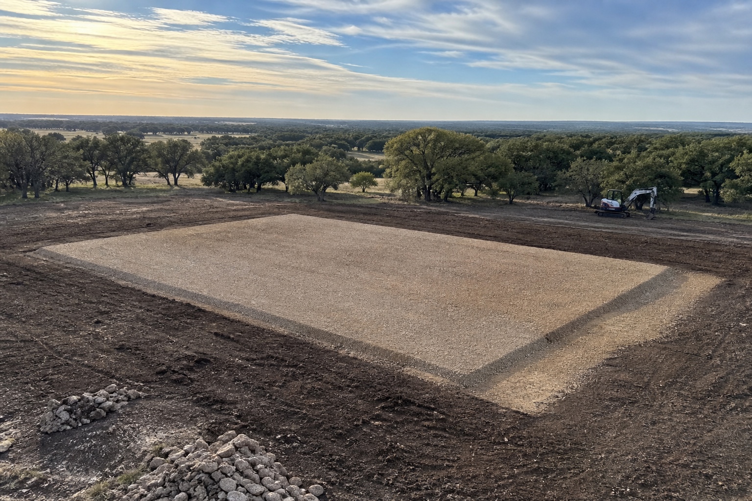 Level building pad prepared for construction in Bell County
